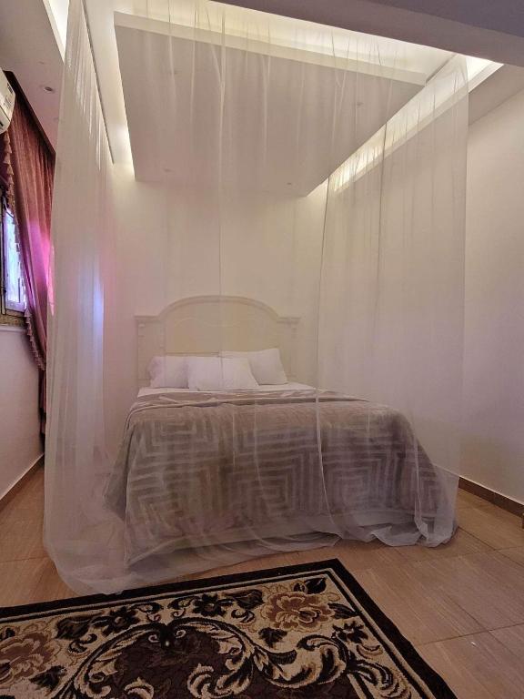 Postel nebo postele na pokoji v ubytování مون لايت Moon Light Villa