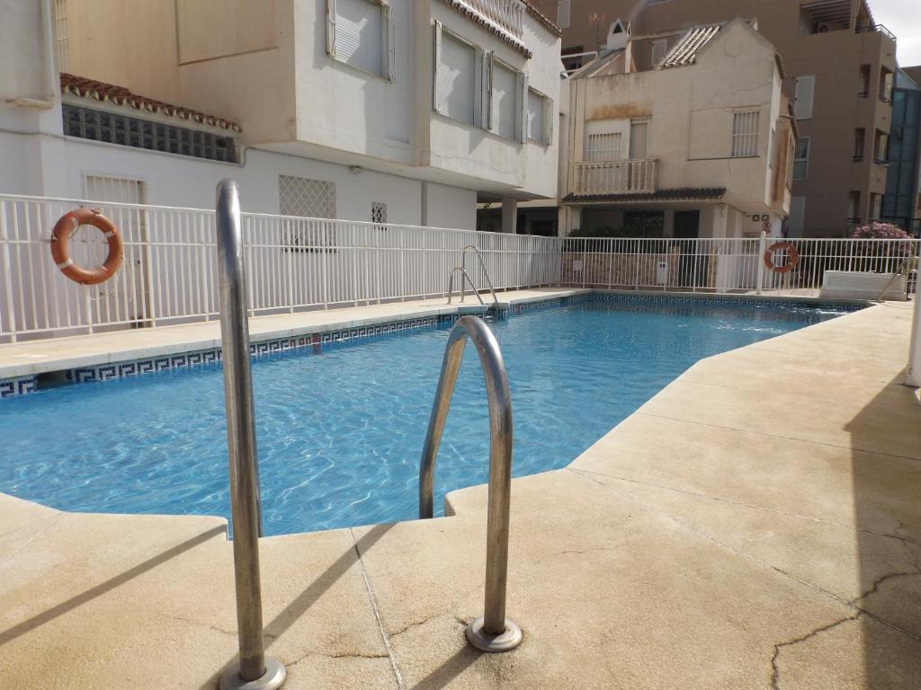 The swimming pool at or close to Encantadora casa Benajarafe