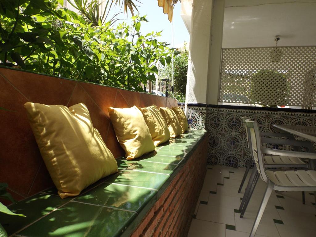 A seating area at Encantadora casa Benajarafe