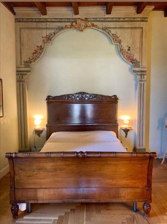 Letto o letti in una camera di B&B Dimora Delle Donnole Bergamo Alta