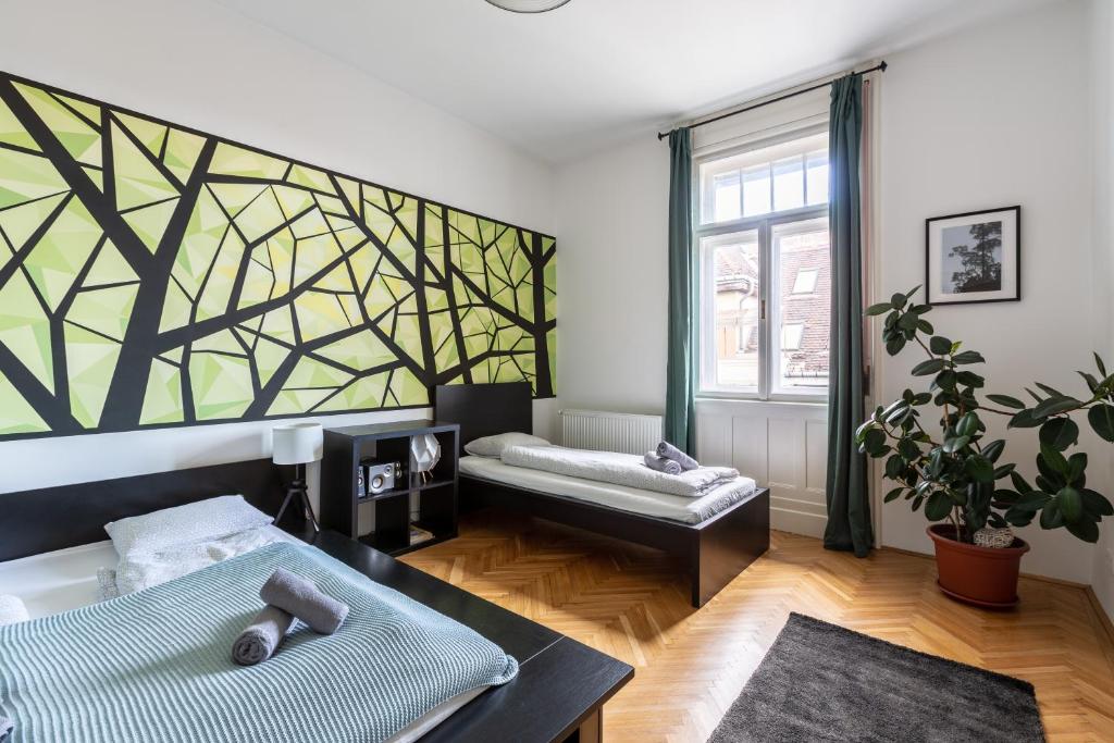 A bed or beds in a room at Art Downtown Home styled by a Local Designer