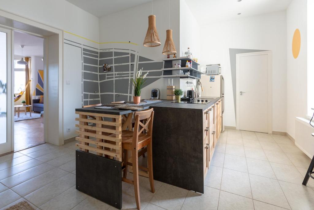 A kitchen or kitchenette at Art Downtown Home styled by a Local Designer