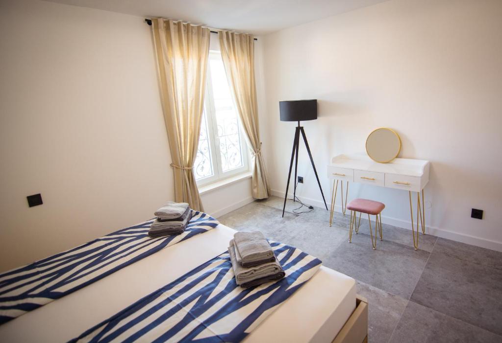 Postel nebo postele na pokoji v ubytování Rooms Salvia