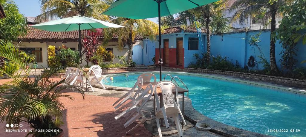 Bazén v ubytování Poseidon Guest House nebo v jeho okolí