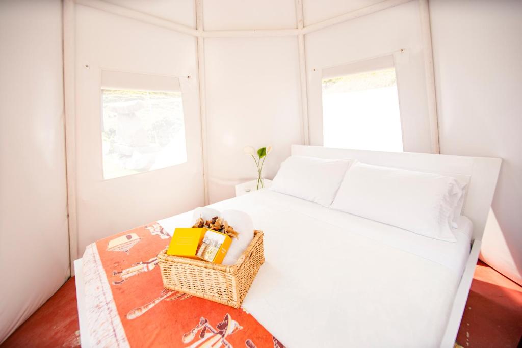 Postel nebo postele na pokoji v ubytování Cerro Tusa Glamping