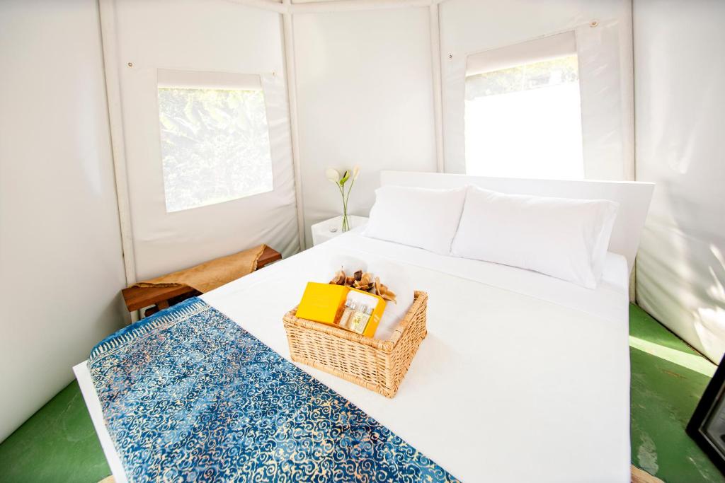 Postel nebo postele na pokoji v ubytování Cerro Tusa Glamping