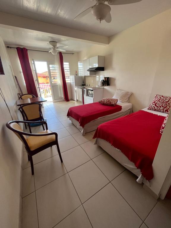 Postel nebo postele na pokoji v ubytování Hôtel DOUCE VAGUE