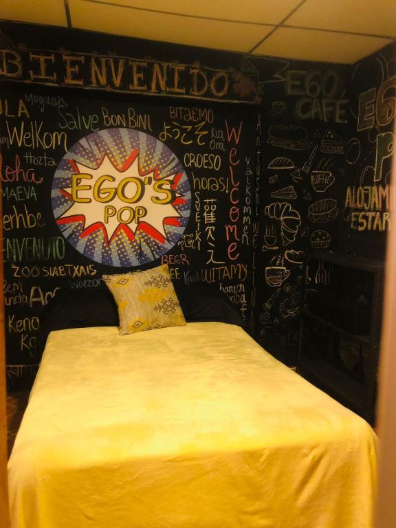 Postel nebo postele na pokoji v ubytování Casa Egos Pop Laureles