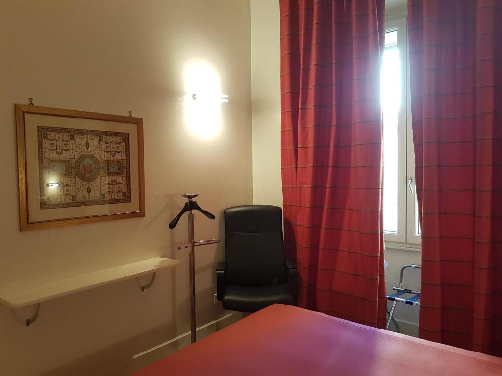 A bed or beds in a room at Popolo square deluxe flat
