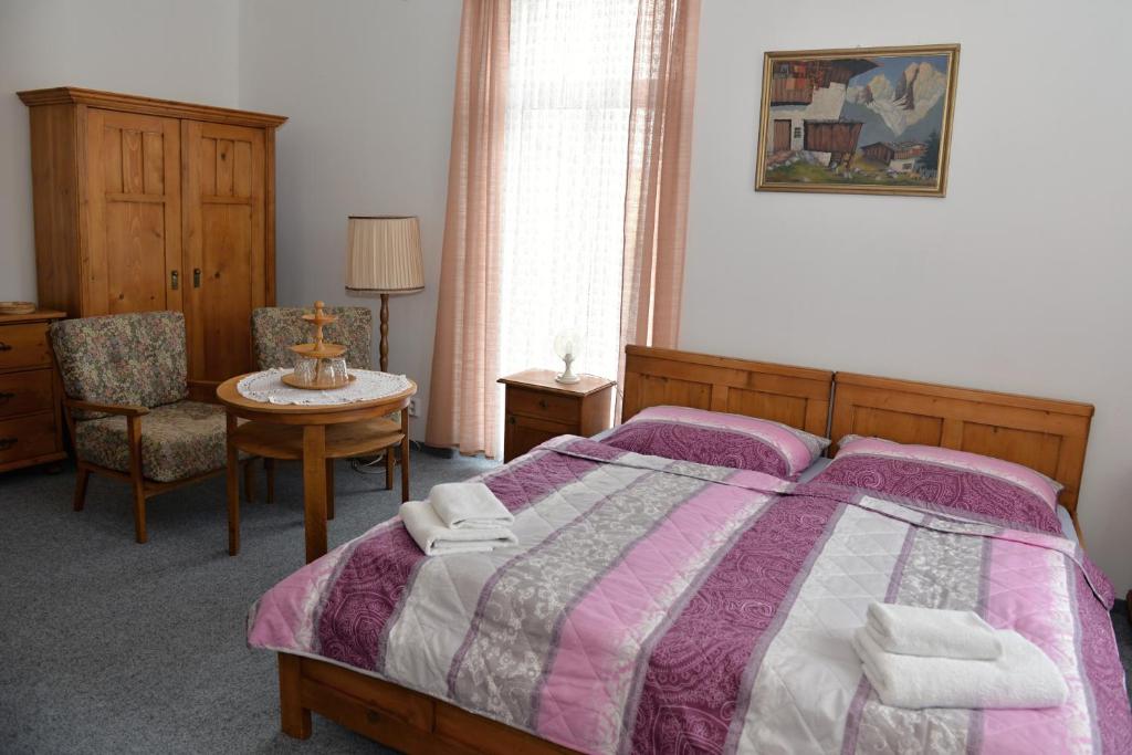 Postel nebo postele na pokoji v ubytování Pension Josef