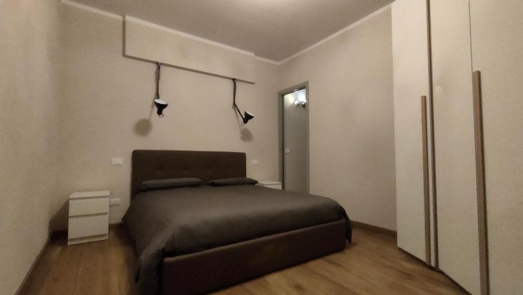 Postel nebo postele na pokoji v ubytování Appartamento indipendente in Franciacorta