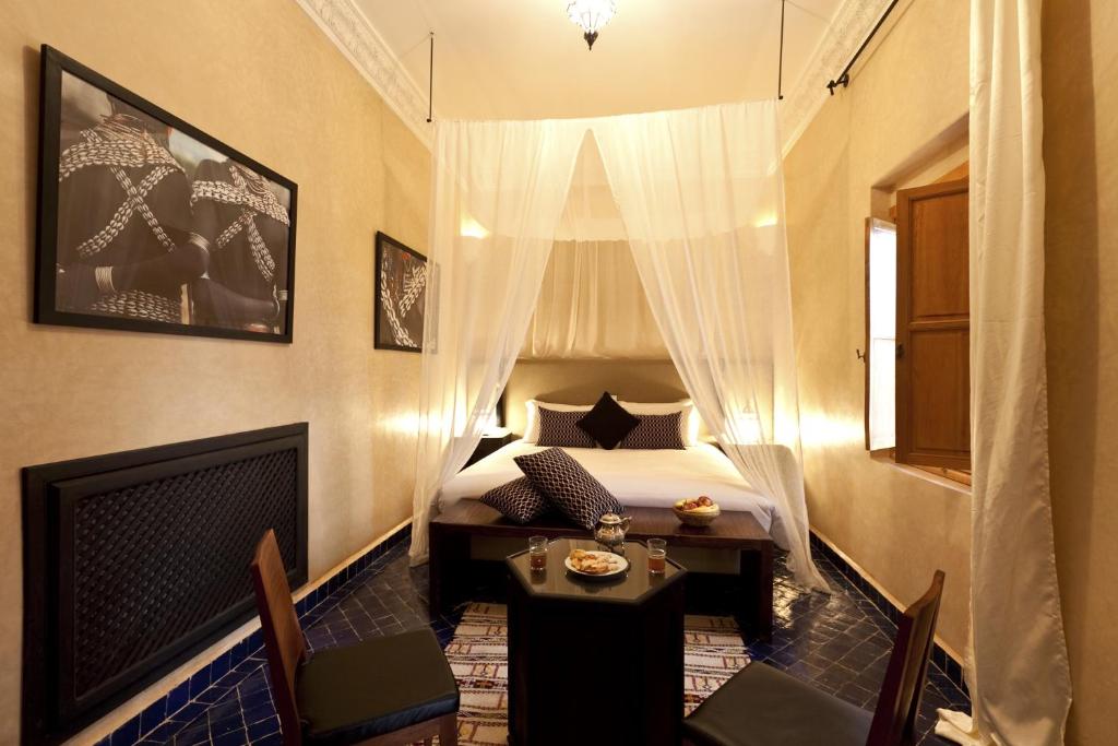 Postel nebo postele na pokoji v ubytování Hotel & Spa Riad El Walaa