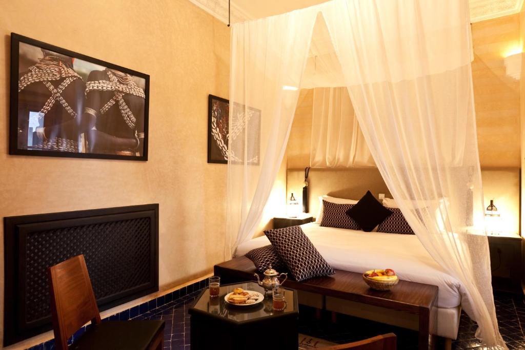 Postel nebo postele na pokoji v ubytování Hotel & Spa Riad El Walaa