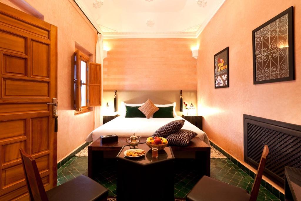 Postel nebo postele na pokoji v ubytování Hotel & Spa Riad El Walaa
