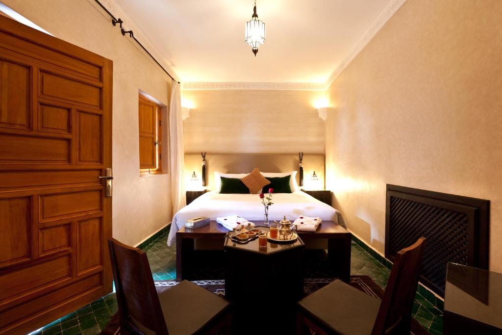 Postel nebo postele na pokoji v ubytování Hotel & Spa Riad El Walaa