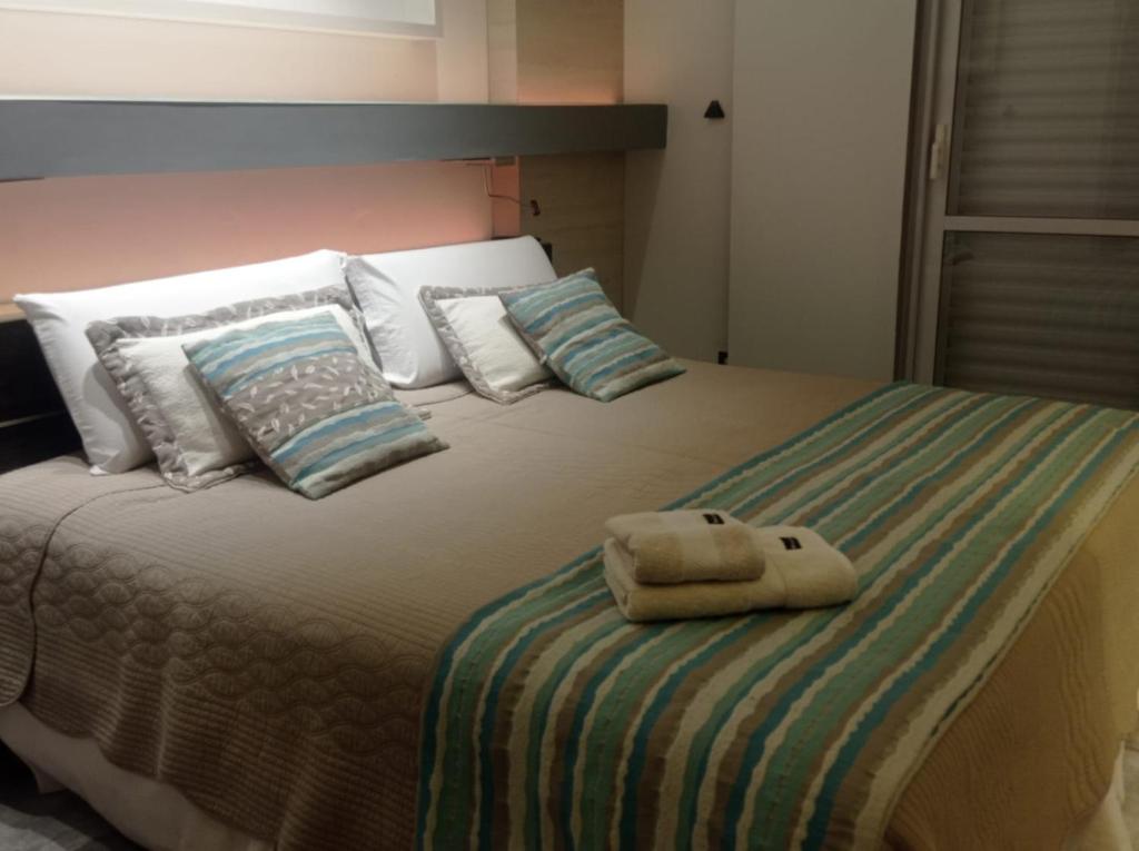 Ένα ή περισσότερα κρεβάτια σε δωμάτιο στο Altos Caution Apart