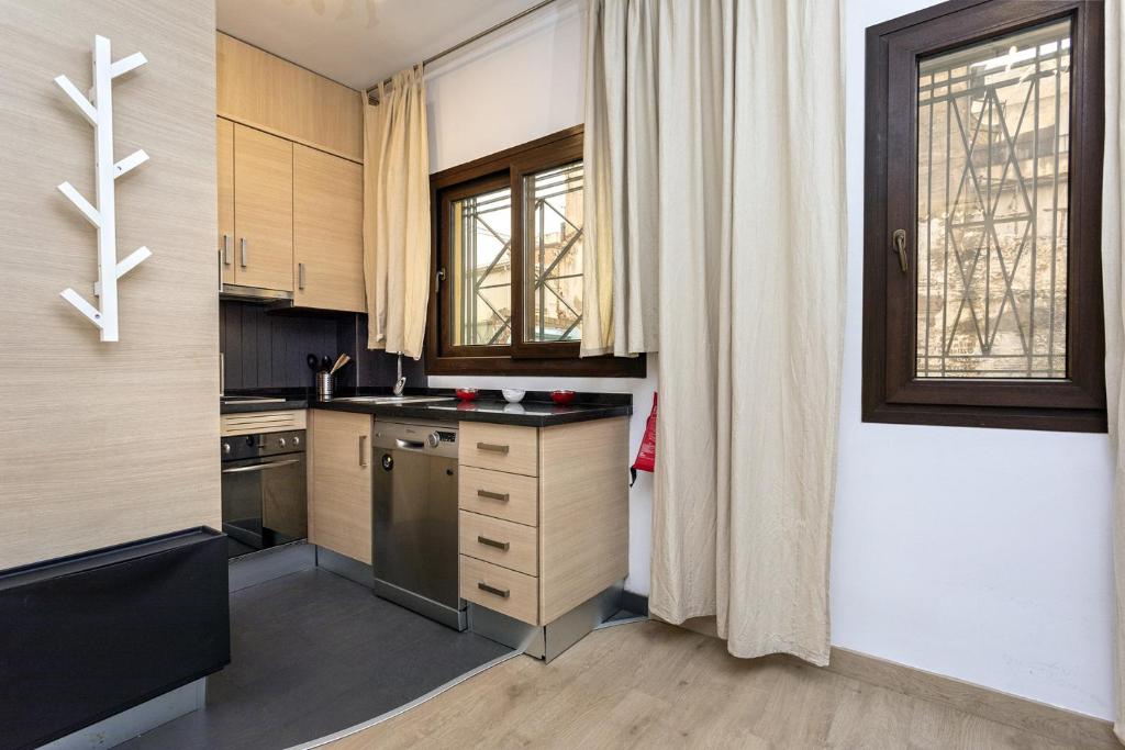 Kuchyňa alebo kuchynka v ubytovaní -MalagaSunApts-Urban&Central