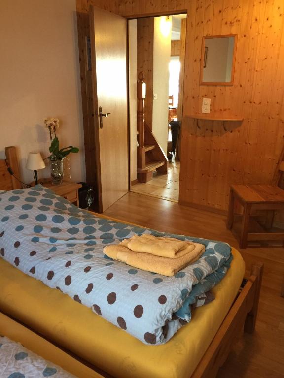 Postel nebo postele na pokoji v ubytování Le Central - Chambres d'hôte