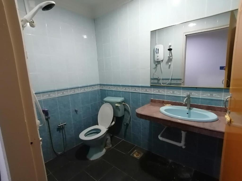Koupelna v ubytování Mi Hotel 2 Dungun