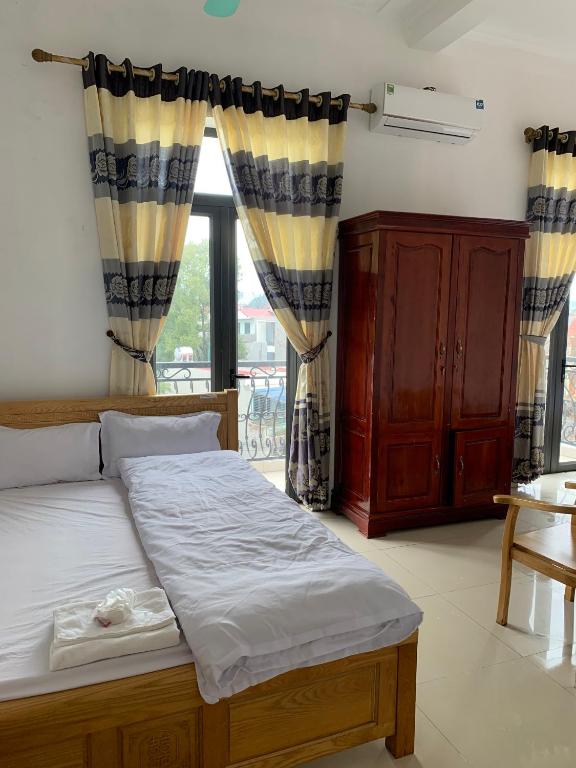 Nhà nghỉ Chiều Tím - Habitación Cuádruple Con Balcón