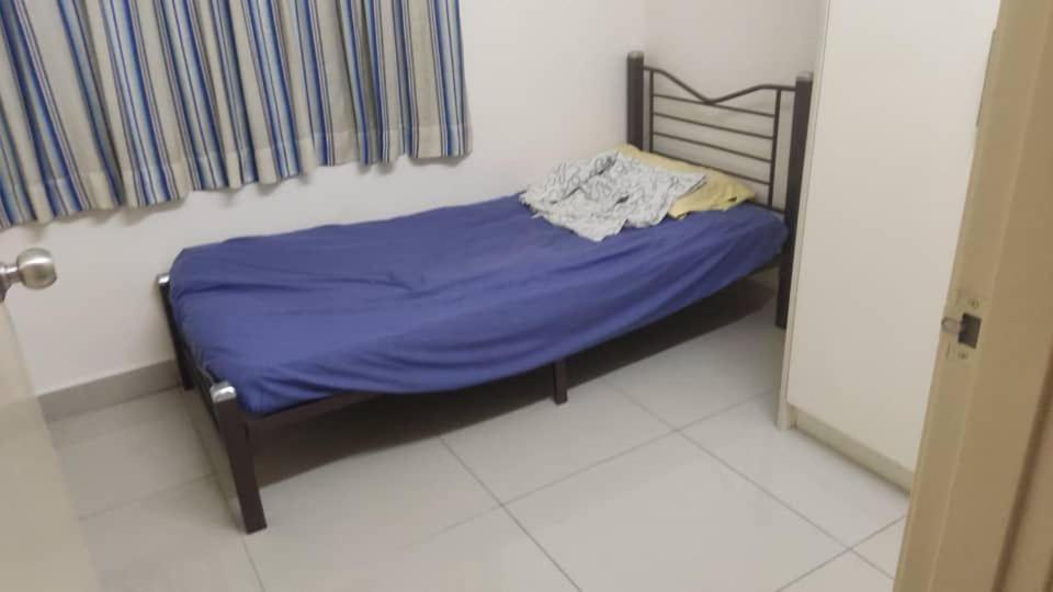 Postel nebo postele na pokoji v ubytování Oug Parklane Small Room