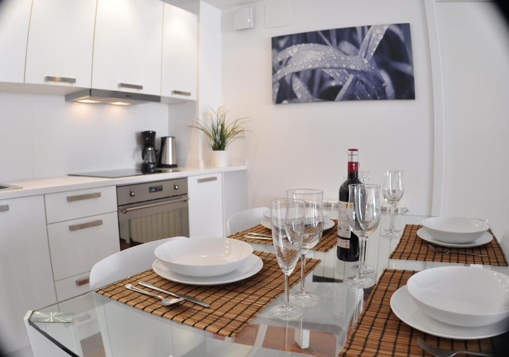 Kuchyň nebo kuchyňský kout v ubytování Glasir Apartments Barcelona