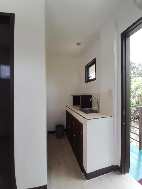 Kuchyň nebo kuchyňský kout v ubytování Palawan Residence