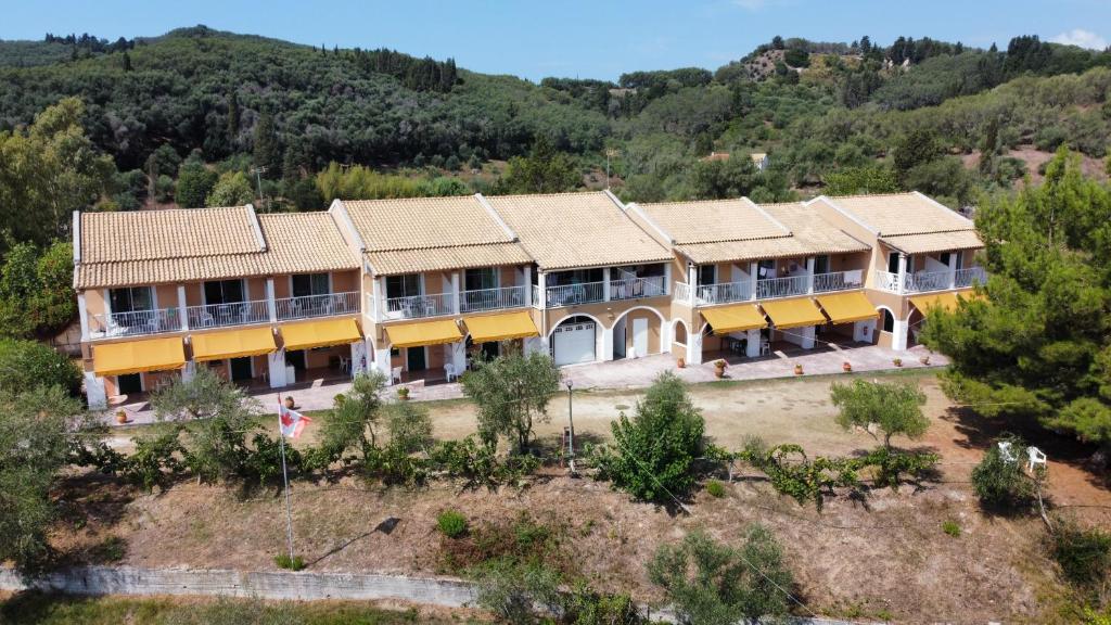 an aerial view of a house in the mountains at Gardenos Hotel in Vitalades