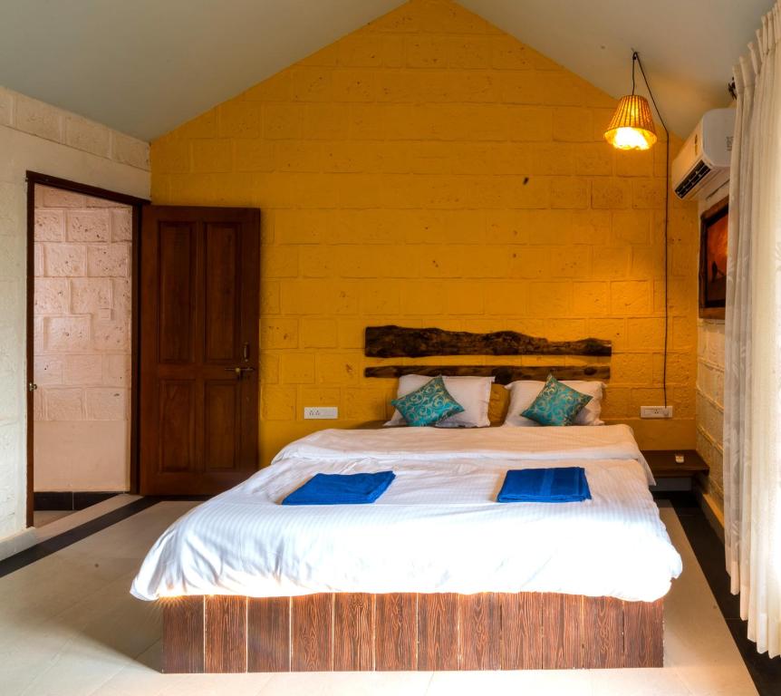 Postel nebo postele na pokoji v ubytování Avontade Suites