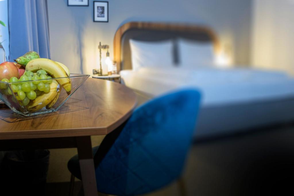 Voodi või voodid majutusasutuse Hotel George Vienna toas