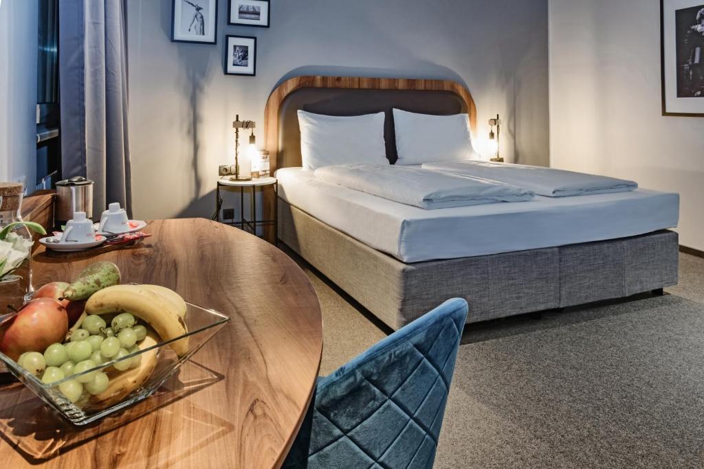 Voodi või voodid majutusasutuse Hotel George Vienna toas