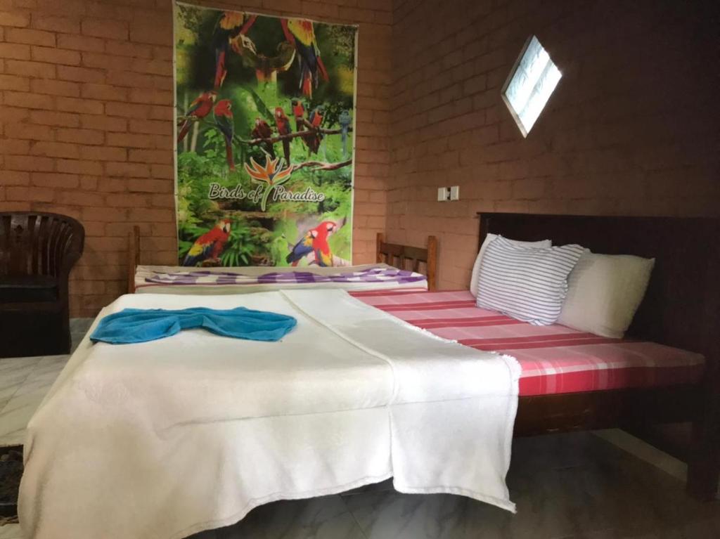 Postel nebo postele na pokoji v ubytování Discovery resort