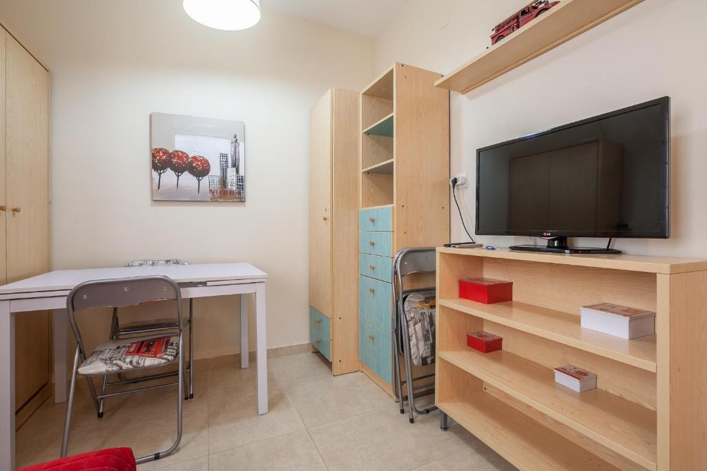 TV a/nebo společenská místnost v ubytování Salado Home