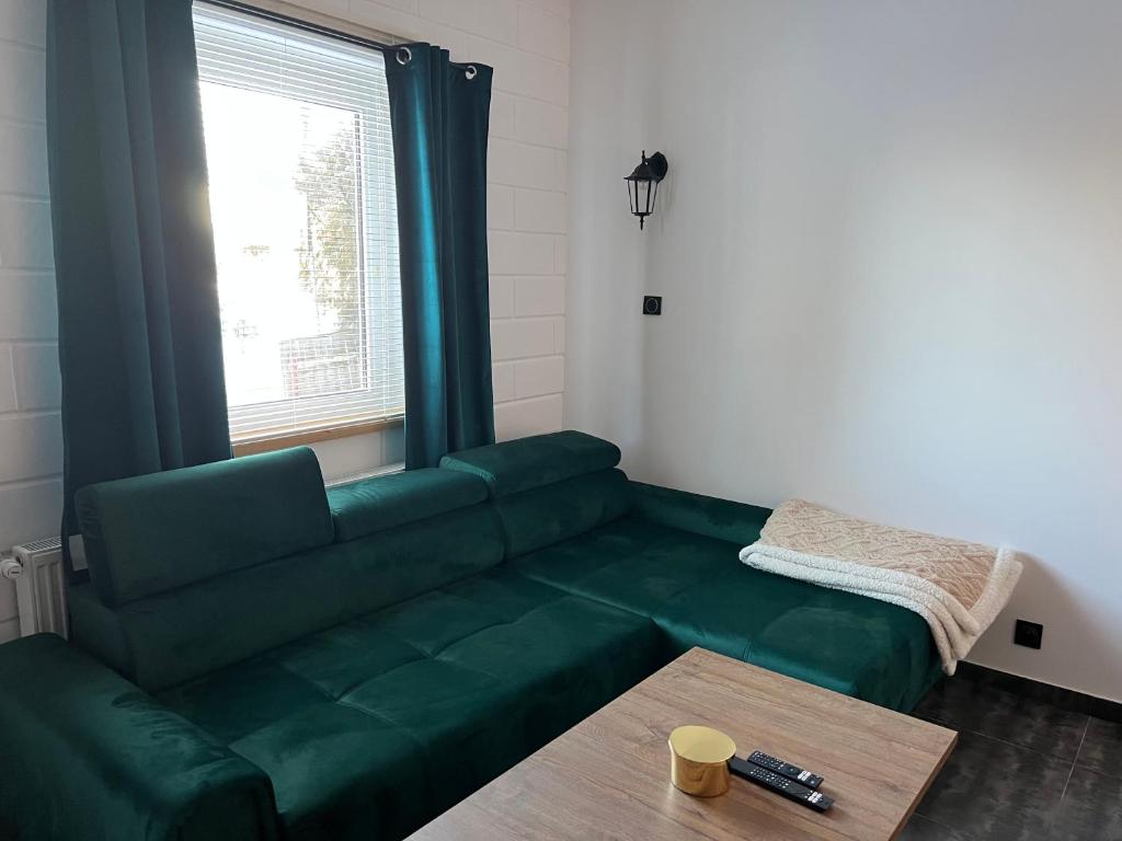Posedenie v ubytovaní Apartamenty Słowianka-BUTELKOWY