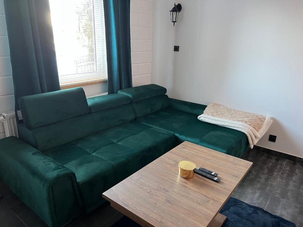 Posedenie v ubytovaní Apartamenty Słowianka-BUTELKOWY