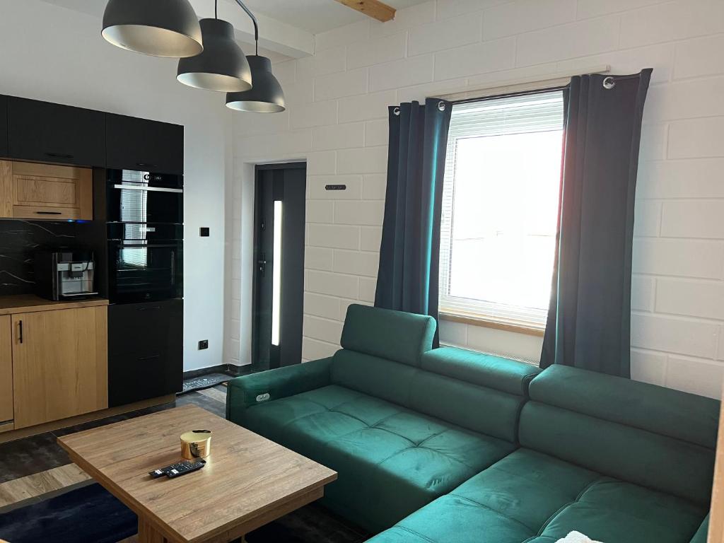 Posedenie v ubytovaní Apartamenty Słowianka-BUTELKOWY