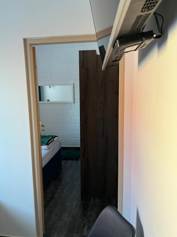 Posteľ alebo postele v izbe v ubytovaní Apartamenty Słowianka-BUTELKOWY