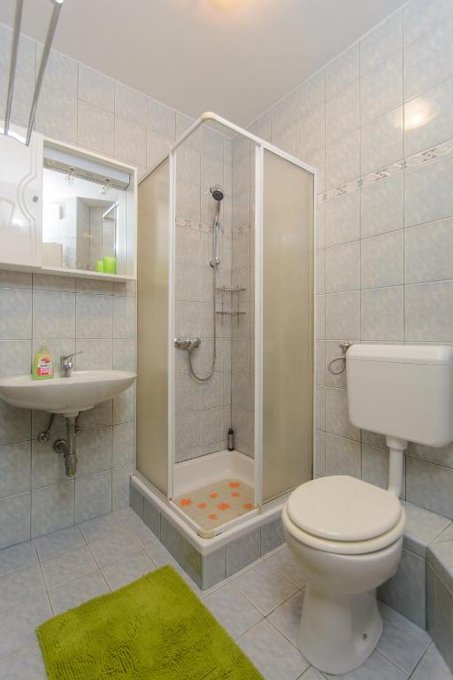 Koupelna v ubytování Apartments Mijo