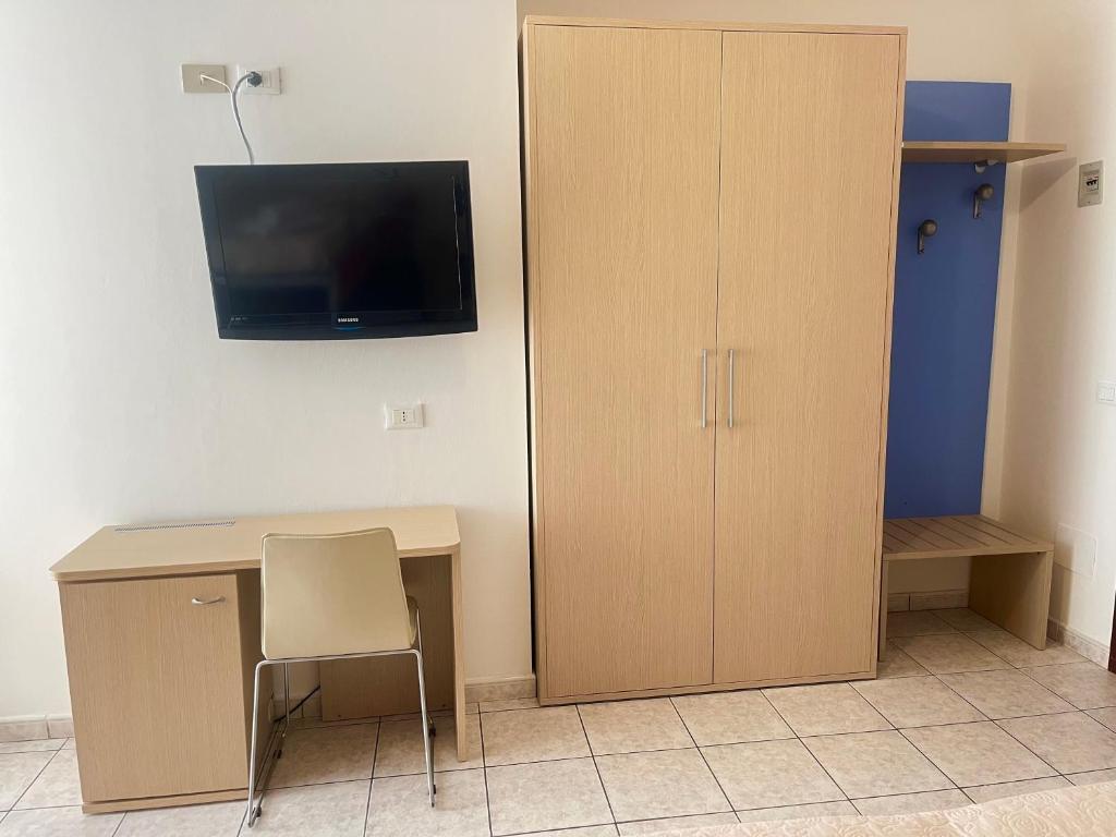 TV a/nebo společenská místnost v ubytování Hotel Rosen Garden