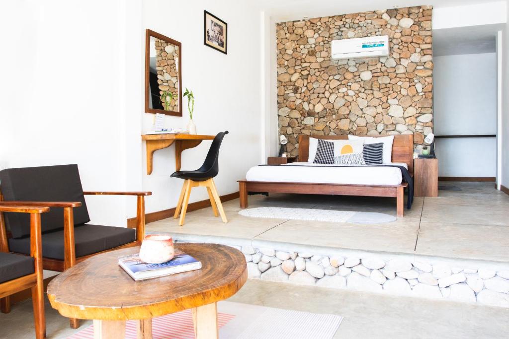 Postel nebo postele na pokoji v ubytování Saravoan-Kep Hotel