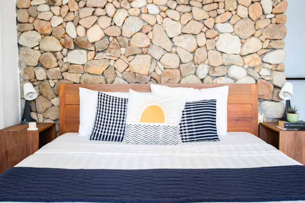 Postel nebo postele na pokoji v ubytování Saravoan-Kep Hotel