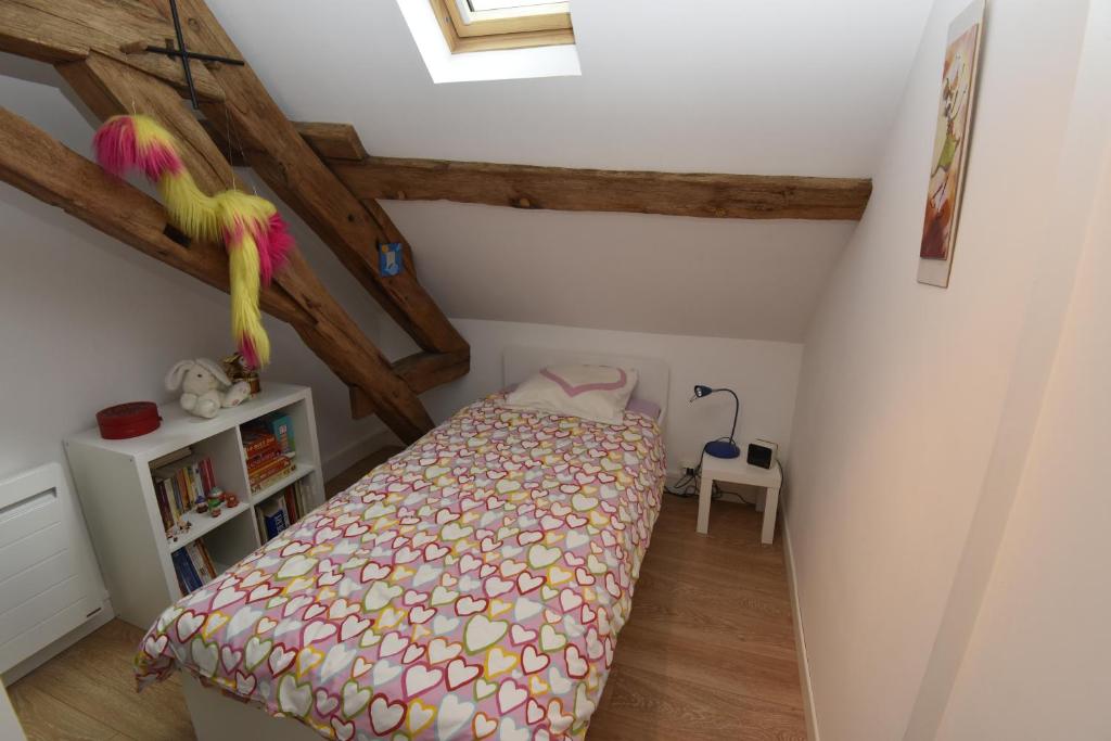 Postel nebo postele na pokoji v ubytování Chambres d'Hôtes L'Hermine Vineuil