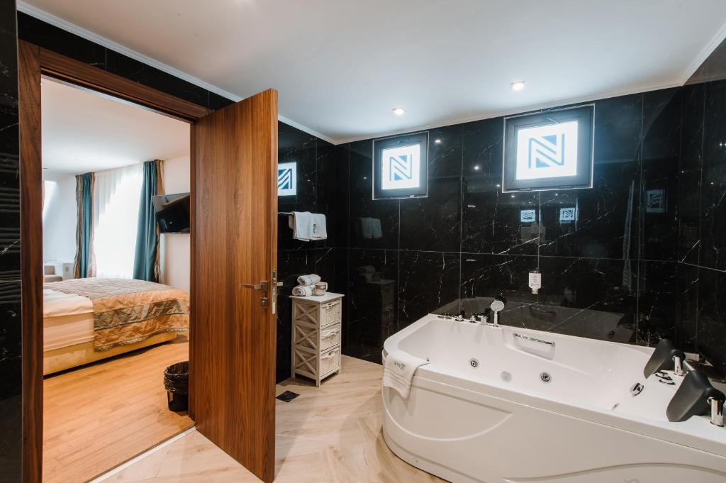 Koupelna v ubytování Hotel Nais