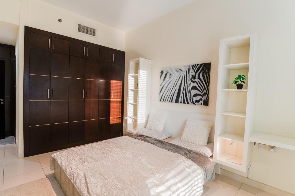 Fotografie z fotogalerie ubytování A Cosy one-bedroom apartment. v Dubaji