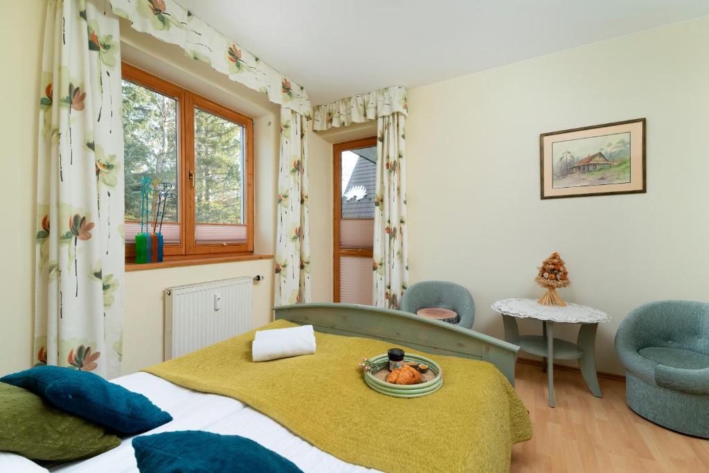 Posteľ alebo postele v izbe v ubytovaní Polana Szymoszkowa Apartment with Mountain View by Noclegi Renters
