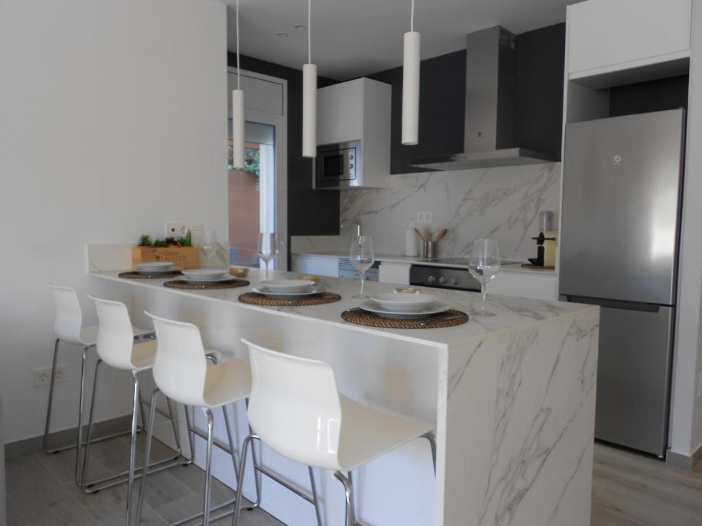 Majoituspaikan Luxury Apartment Cambrils keittiö tai keittotila