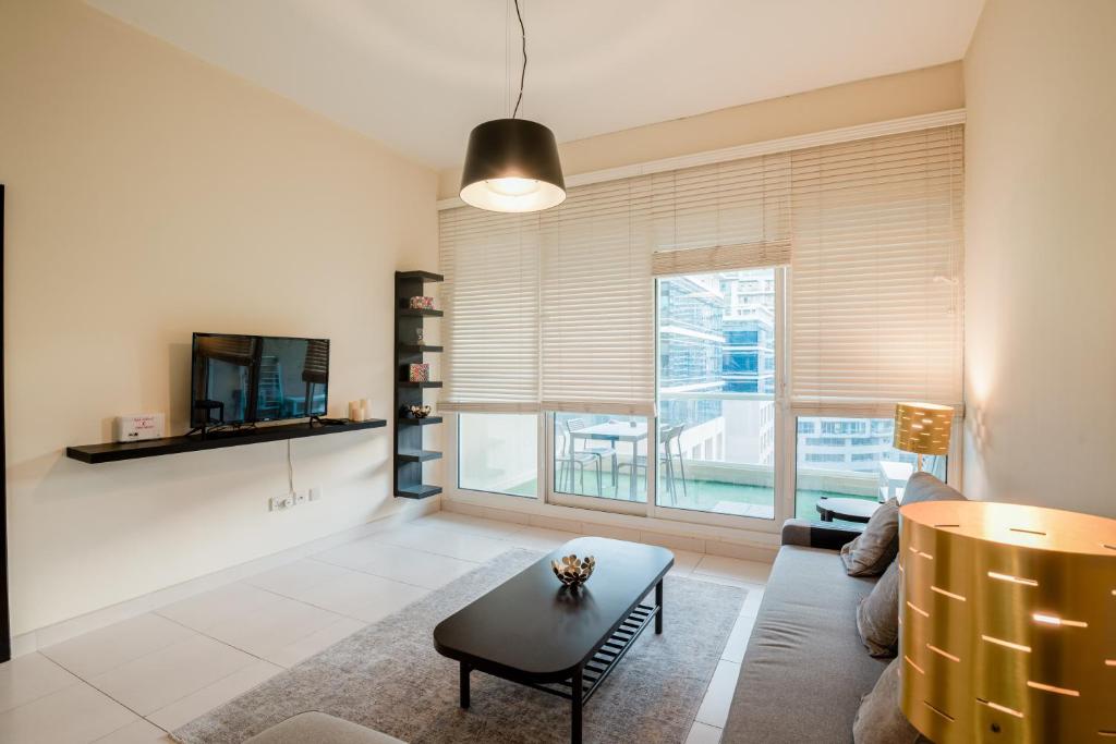 Fotografie z fotogalerie ubytování A Cosy one-bedroom apartment. v Dubaji