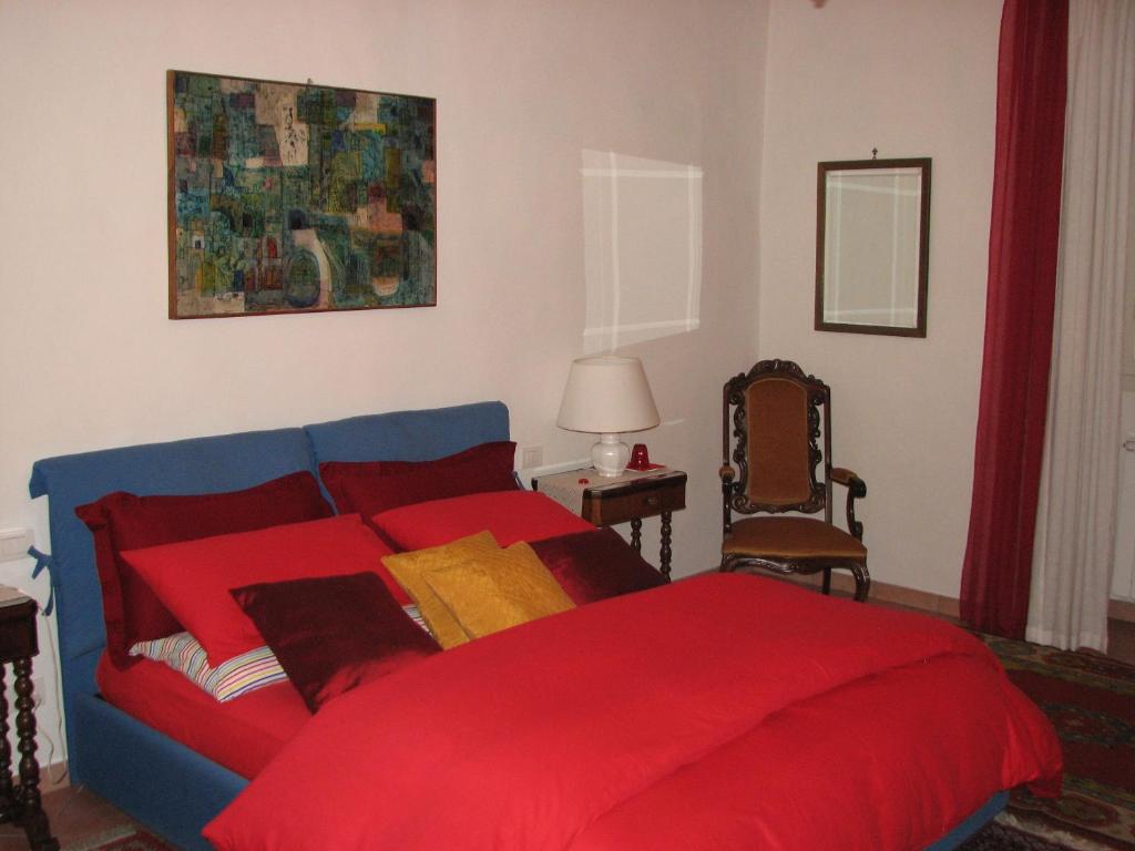 Postel nebo postele na pokoji v ubytování B&B Fiordaliso