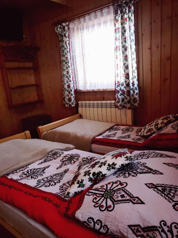 Posteľ alebo postele v izbe v ubytovaní Agroturystyka u Marii