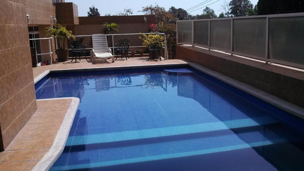 Swimming pool sa o malapit sa Hotel Real Santa María